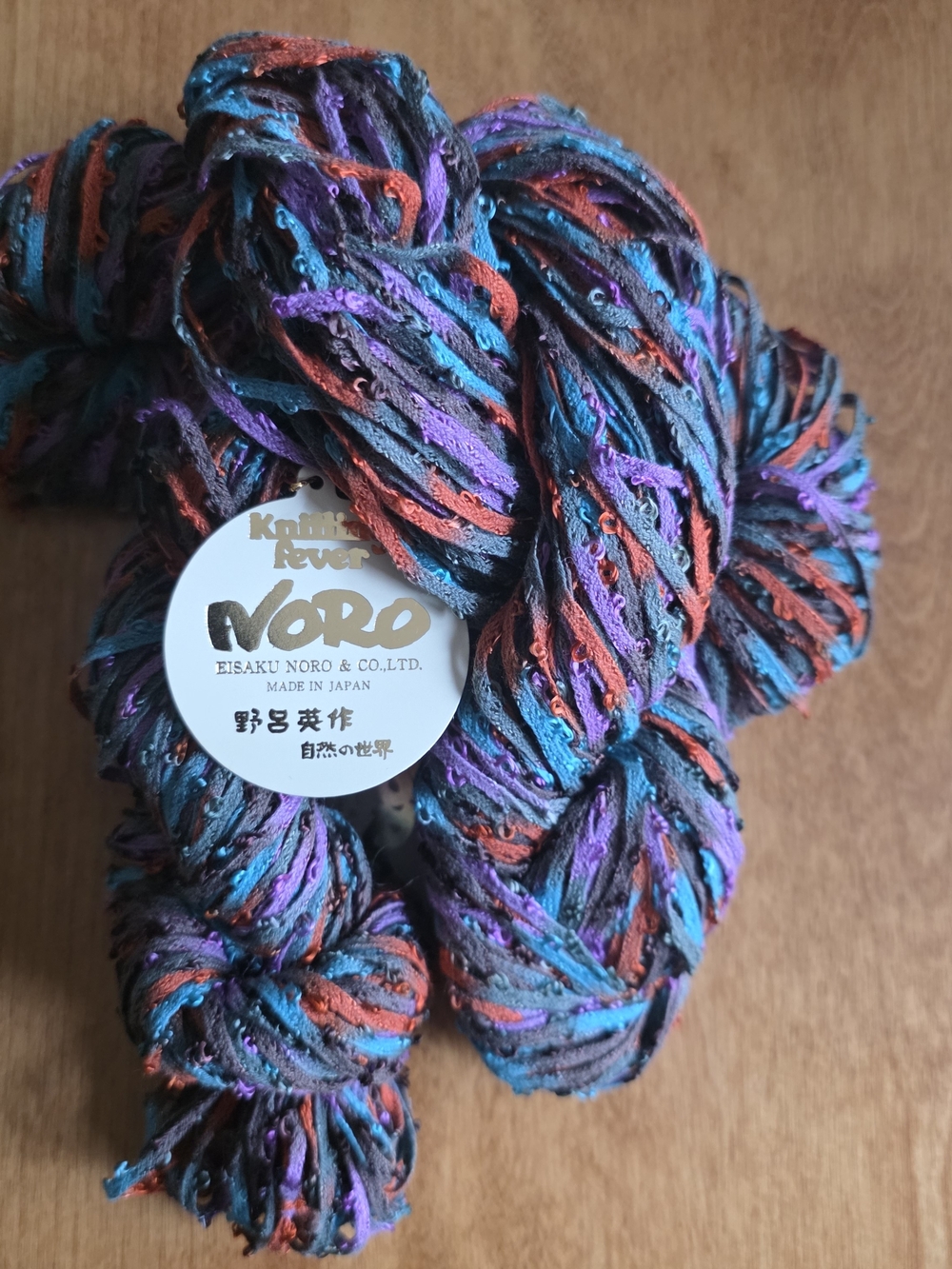 Noro Shabon Ribbon Yarn in Teal, Purple, Orange & Black